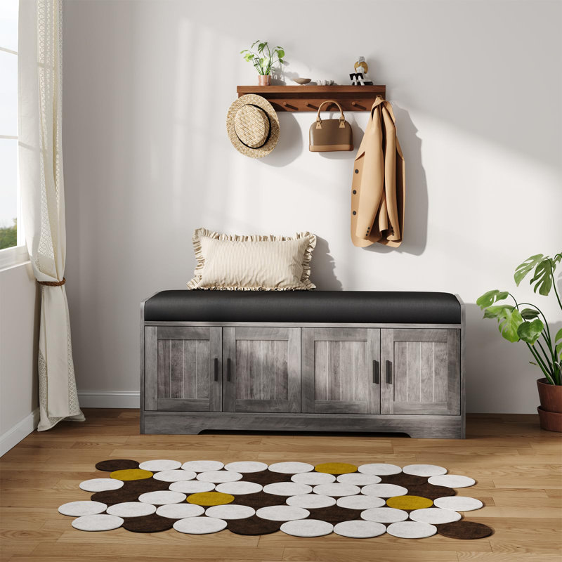 Banc à chaussures avec coussin et rangement dissimulé à 4 portes, banc de rangement pour entrée moderne avec cadre en bois robuste, gris
