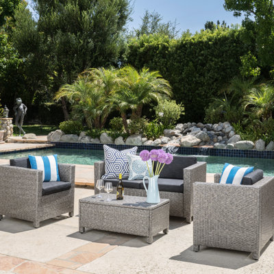 Jardin 4 pièces avec cadre en fer et en fer Patio Confort:, fauteuils club, coussins de table