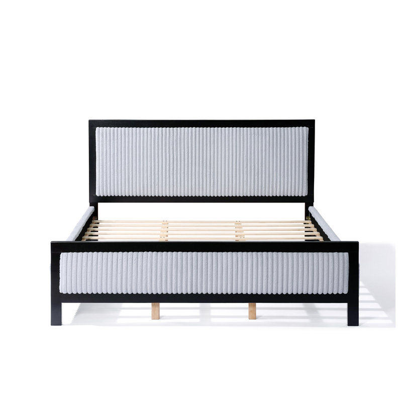 Très grand lit à panneau tapissier avec tête de lit moelleuse, structure en bois noir et tissu en polyester gris