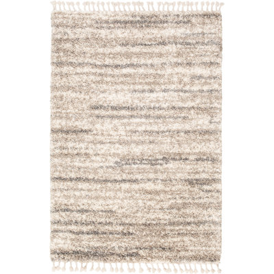 Tapis beige à poils longs Roush