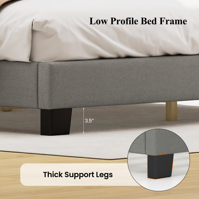 Grand lit plateforme tapissier en lin avec support en lattes de bois