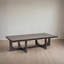 Table basse rectangulaire en bois de manguier avec piètement à tréteaux moderne