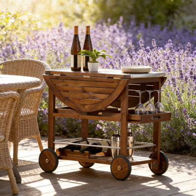 Outdoor Drop-Leaf Bar Cart with Wine Storage, Removable Trays, and Locking Wheels for Effortless Entertaining.