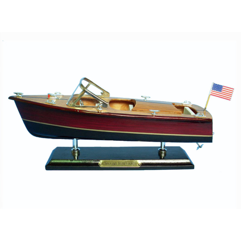 Bateau à trois cockpits en bois noir