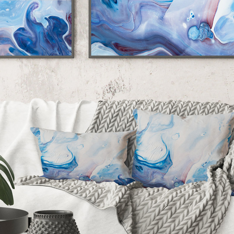 Coussin décoratif bleu clair et rose clair