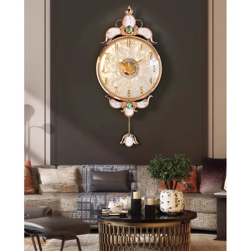 Horloges murales en forme de coquillage en métal doré blanc, H 15,16 po x l 34,25 po