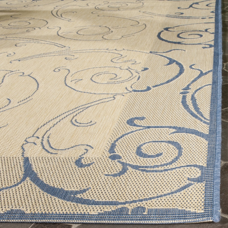 Tapis d'intérieur / extérieur floral Amaad Performance, Rond 7 pi 1 po