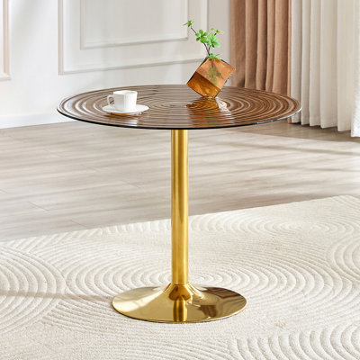 Table ronde en verre brun clair de 35 po de diamètre avec anneaux de luxe brun clair. Pilier en métal doré. Table de table, table basse pour la maison, table de salle à manger. Convient aux petites salles à manger de 2 à 4 personnes.