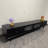 Elegant TV stand with smooth rounded edges-106447162