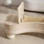 Table basse irrégulière avec plateau rabattable et compartiment de rangement caché