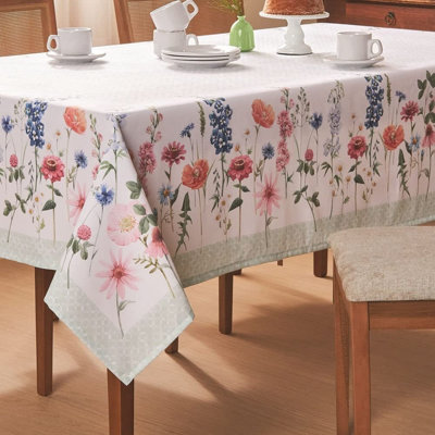 Halida Floral printed tablecloth with wildflowers in shades of pink and blue with light green geometric border