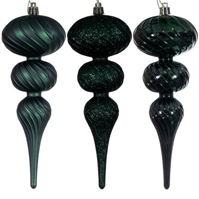 Assortiment d'ornements en forme de tourbillon argenté de 8 po. Deux mat, deux brillants et deux paillettes.