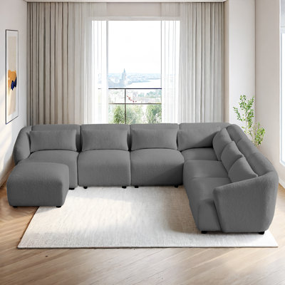 Canapé modulaire modulaire en U avec repose-pieds 6 places Clouda