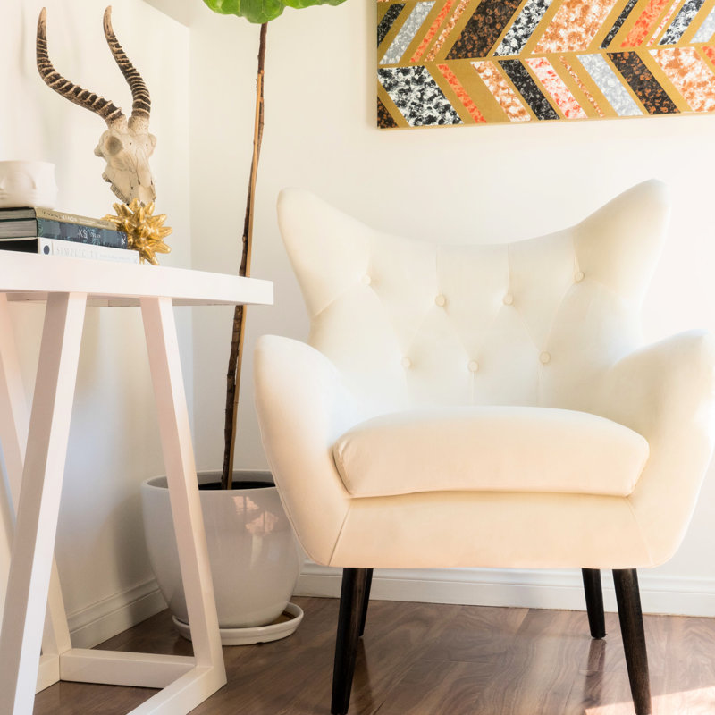 Fauteuil d'appoint en velours avec coussin en mousse et accoudoirs à finition pattes évasées