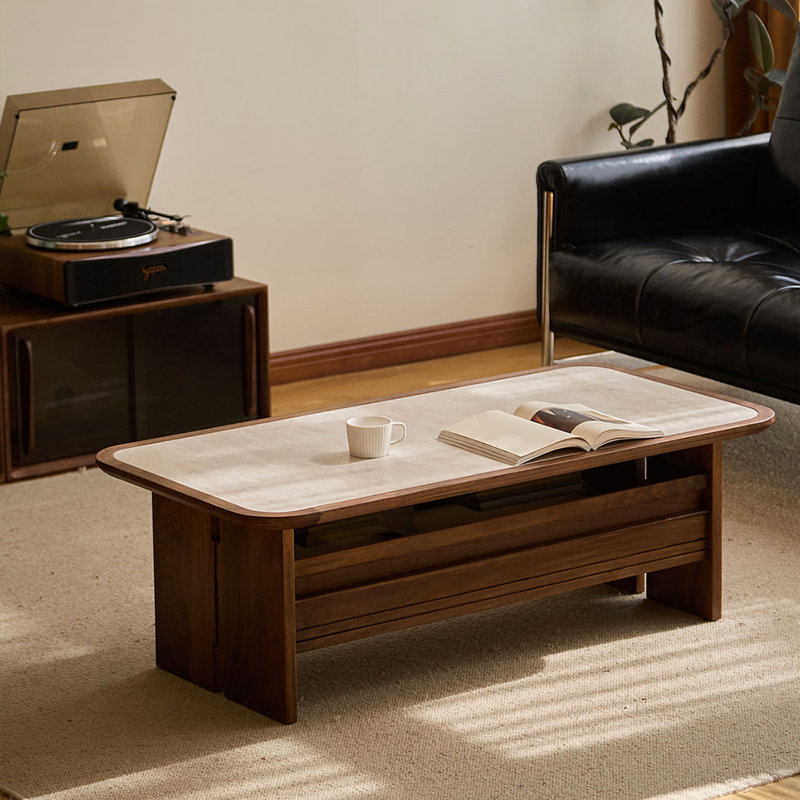 Table basse beige en pierre et bois de noyer