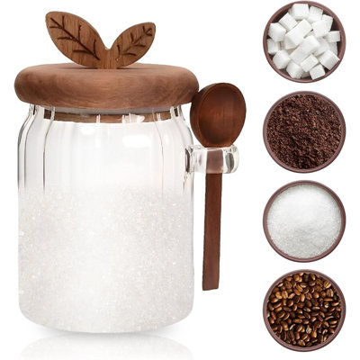 Ce sucrier en céramique blanche de 13 oz avec un couvercle en bambou naturel et une cuillère assortie est une pièce décorative élégante pour les bars à café et les espaces de cuisine.