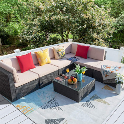 Nia All-Weather 7 Piece Rattan Sofa Seating Group with Cushions