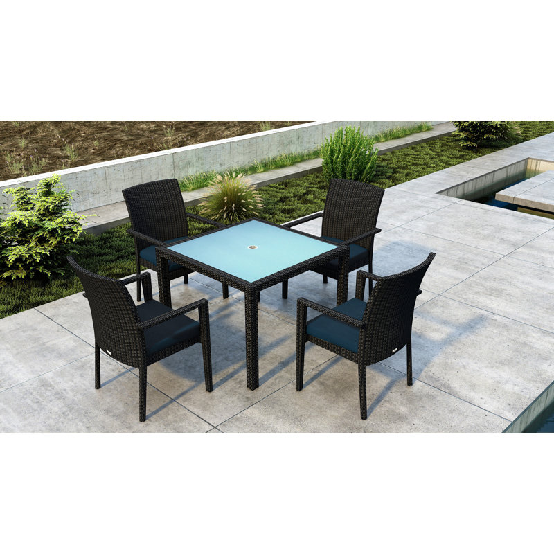 Thornaby 4 - Person Wicker Patio Dining Set with Square Table, Spectrum Indigo Sunbrella®