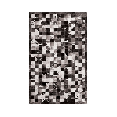 Barcelona Animal Print Handmade Tufted Faux Sheepskin Black/White Area Rug