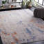 Tapis gris / orange en polypropylène / polyester tissé à la machine Chadae-175370958