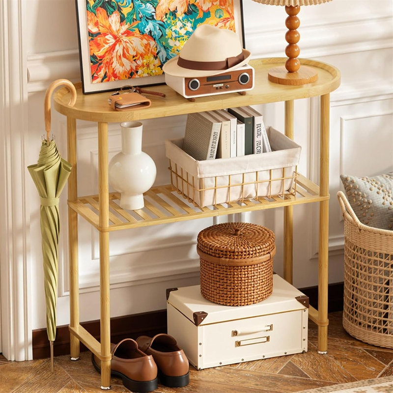 Petite console en bambou avec plateau ovale, rangement à 2 niveaux et rebord surélevé, idéale pour une entrée étroite, comme table d'appoint pour canapé, support pour plantes ou meuble télé pour chambre.