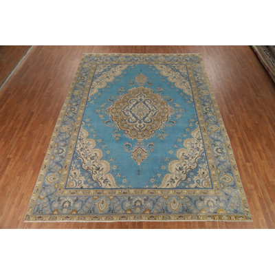 Tapis traditionnel bleu en médaillon en laine 10 x 13