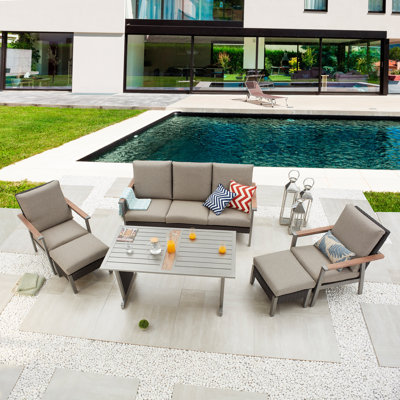 Bertolde 5 - Person Steel Patio Dining Set Rectangular Table with Cushions Included