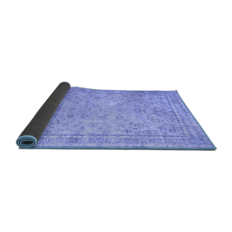 Tapis oriental bleu tissé à la machine 8 pi x 8 pi Hildra