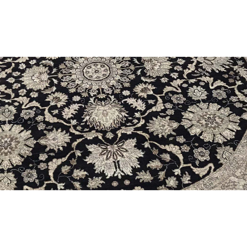 Tapis rond noir et crème de haute qualité noué à la main