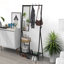 Portemanteau industriel avec miroir, rangement pour chaussures et structure en métal