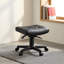 Tabouret repose-pieds pivotant à hauteur réglable et à roulettes, idéal pour le bureau et le salon.