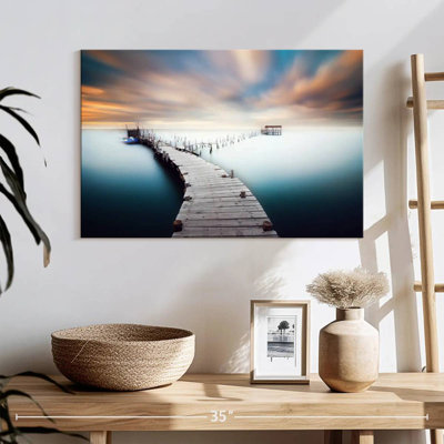 Dock over azure waters Aletra