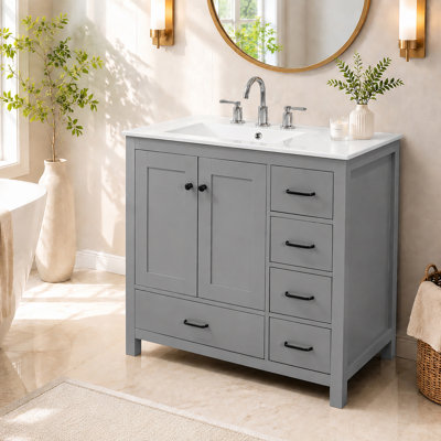 Meuble-lavabo autoportant de 36 po avec lavabo en céramique, 5 tiroirs et 2 portes à fermeture en douceur, avec cadre en bois massif