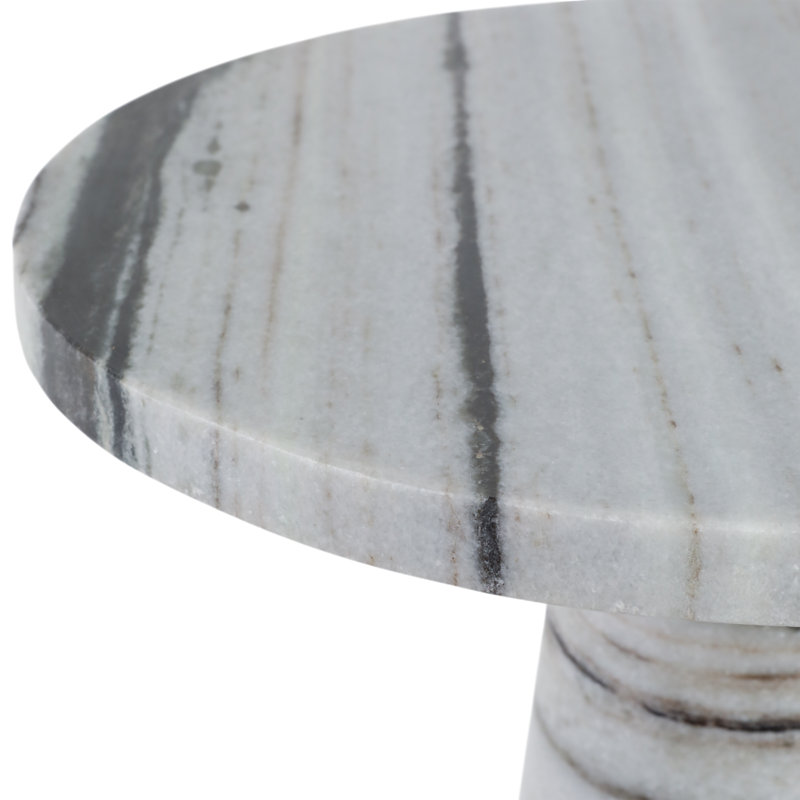 Table d'appoint en marbre avec une base fuselée élégante dans un design minimaliste moderne