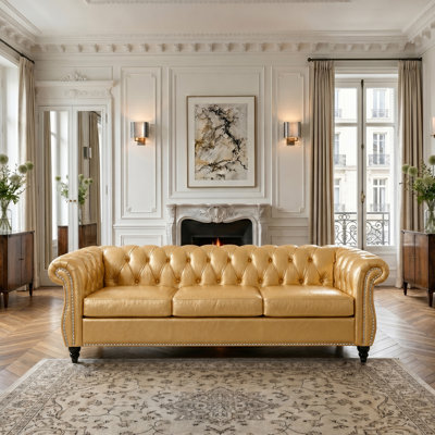 Canapé Chesterfield à accoudoirs roulés avec revêtement en similicuir