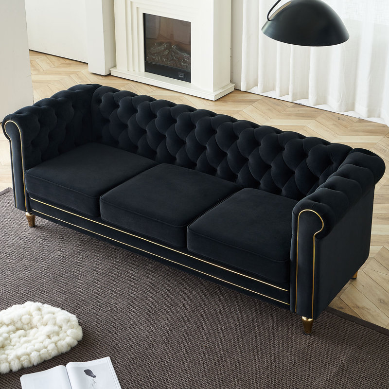 Canapé Chesterfield en velours à accoudoirs roulés Gevon, Noir