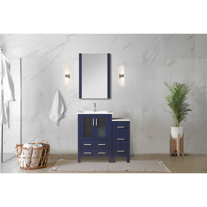 Meuble-lavabo simple de 91 cm de large, bleu marine, robinetterie incluse, comptoir en céramique blanche, espace de rangement et placard intérieur.