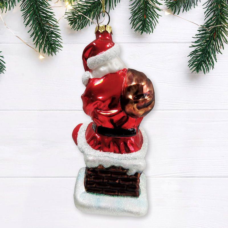 Ornement de Noël père Noël sur verre de cheminée