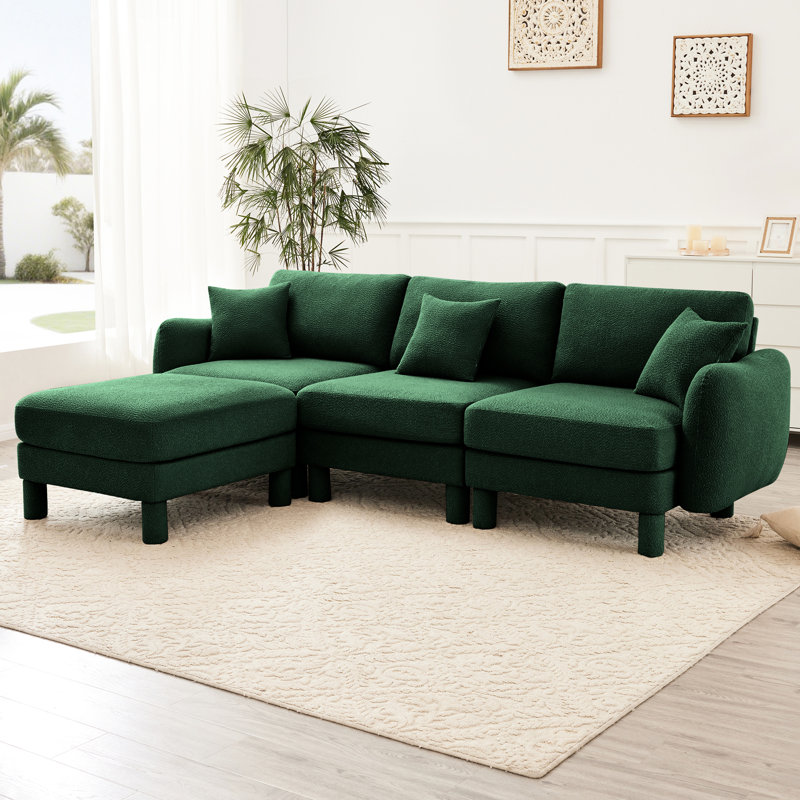 Canapé modulaire convertible en tissu à 3 boucles avec structure en bois robuste en forme de coquillage et pieds cylindriques distinctifs rembourrés en mousse dense pour l'assise
