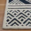 Tapis rayé ivoire / bleu en laine / coton touffeté à la main Brizendine-972651929