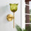 Applique murale dorée en fer 1 lumière avec abat-jour en verre vert
