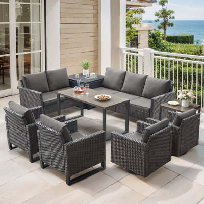 Ingvald 9 Person Outdoor Courtyard Wicker Family Conversation Set Group With Swivel Chairs And Storage