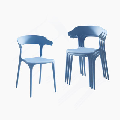 A Set Of 4 Stacked Chairs