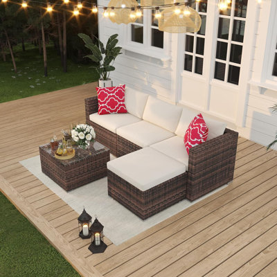 Ensemble de canapé d'extérieur 5 pièces en rotin avec table de rangement et repose-pieds pour le jardin