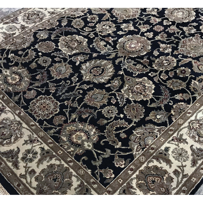 Tapis noir et ivoire de haute qualité noué à la main