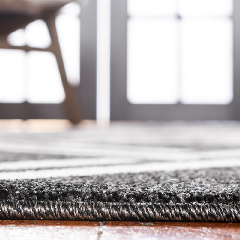 Tapis noir à motif géométrique Cand, Rond 8 pi