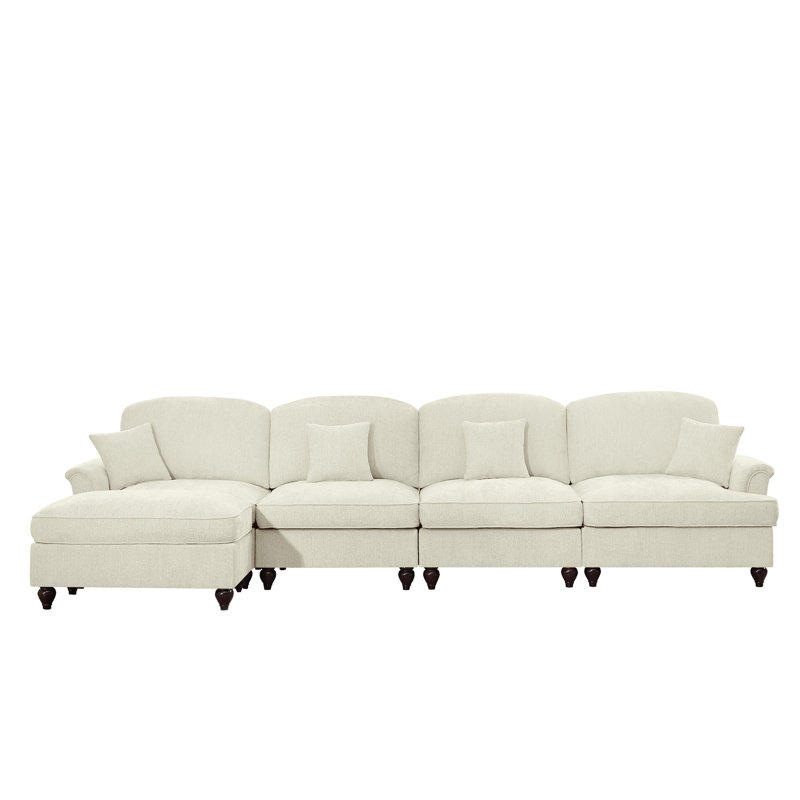 Canapé modulaire classique à trois places en forme de L avec accoudoirs évasés et volants amovibles, jupes plissées et pieds fuselés, canapé à quatre places en chenille confortable avec repose-pieds mobile