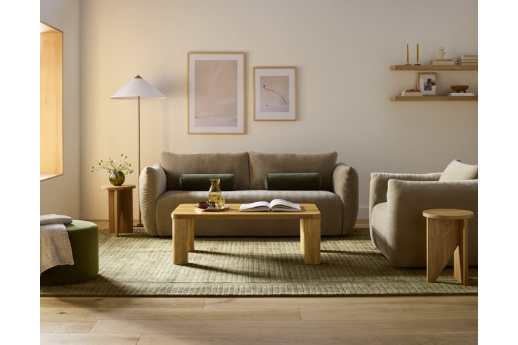 modern style small living room with a small gray sofa and a gray loveseat arranged around a rectangular coffee table