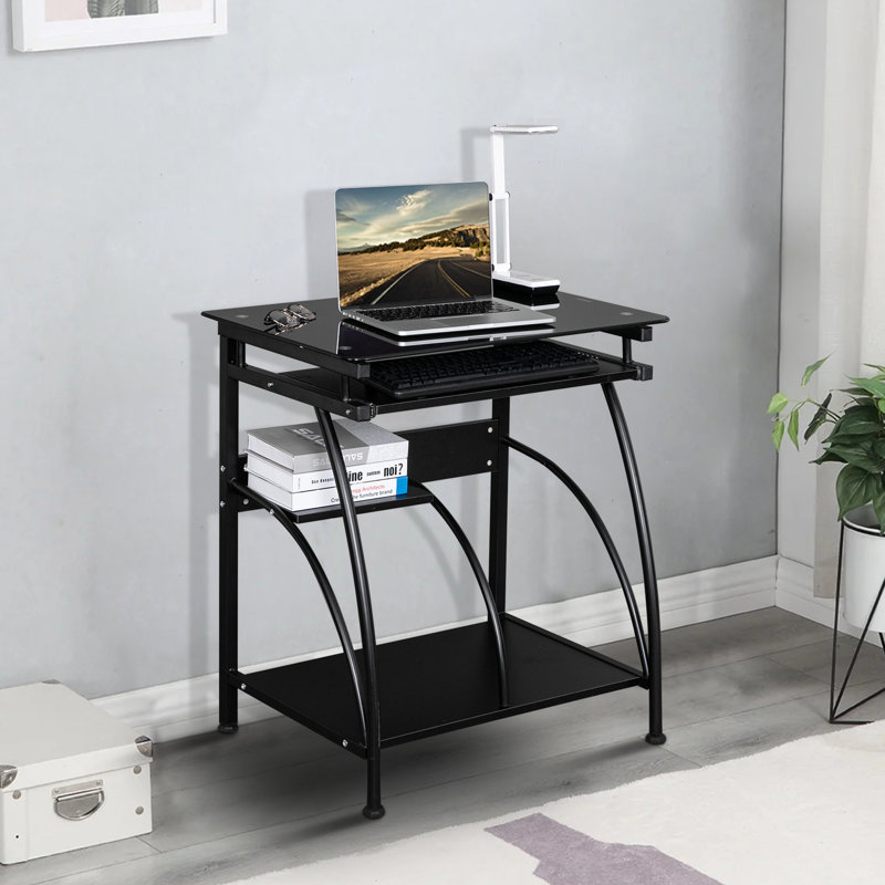 Bureau d'ordinateur moderne en verre noir avec cadre en acier et plateau à clavier