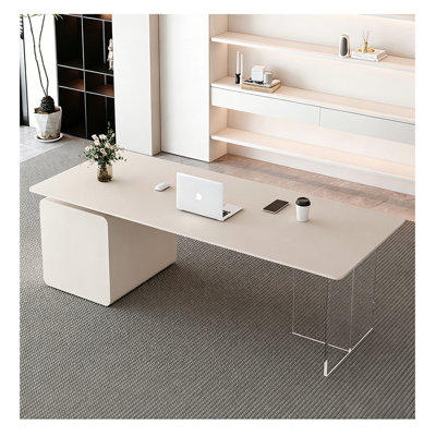 Bureau avec plateau en pierre frittée, pieds en acrylique et base latérale pleine